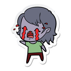 sticker of a cartoon crying vampire girl
