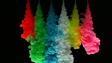 Super slowmotion shot of colorful inks in water. Shot with high speed camera at 4K.