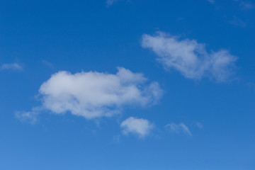 White clouds on a blue summer sky.