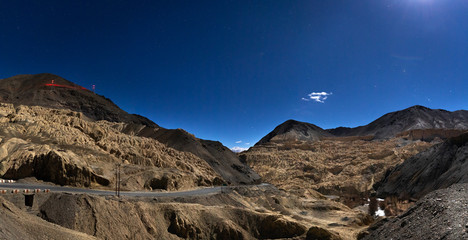 Fototapeta premium Dry cold dessert landscape of Lamayuru in Ladakh at night