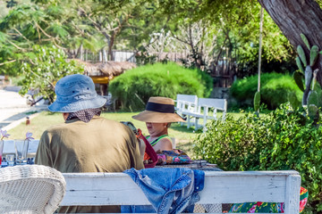 Happy senior couple relaxing in the garden