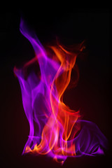 Multi Color Fire Flame Abstract on black background. A mystic colorful smoke. Blurry bright abstraction with colored lines. Magic fire 