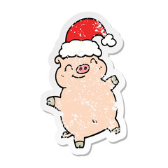 distressed sticker of a cartoon happy christmas pig