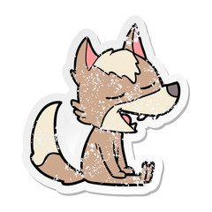 distressed sticker of a cartoon wolf laughing