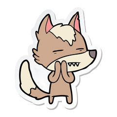 sticker of a cartoon wolf showing teeth