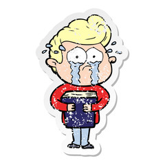 distressed sticker of a cartoon crying man holding book