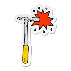 sticker of a cartoon pin hammer