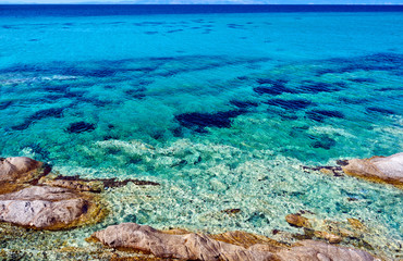 Rocky coast and turquoise sea in Greece