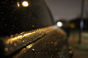 car window close up in rain 