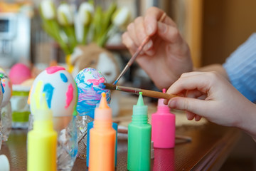 Funny painted eggs with bright colors. Happy easter