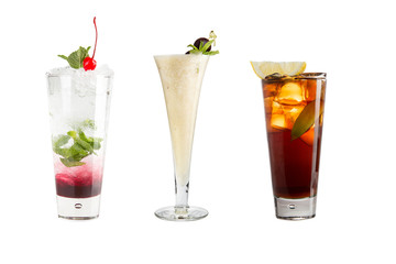 A variety of alcoholic drinks, beverages and cocktails on a white background. Three different refreshing drinks.