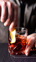 barman making cocktail