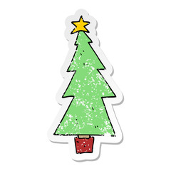 distressed sticker of a cartoon christmas tree