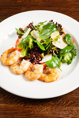 fried shrimps with salad