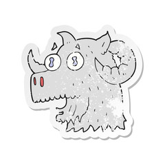 retro distressed sticker of a cartoon ram head