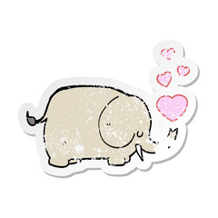 distressed sticker of a cute cartoon elephant with love hearts