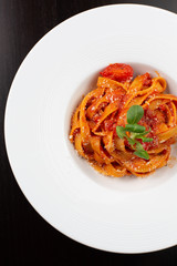 pasta with tomato sauce and basil