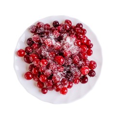 Cranberry with sugar on a white plate