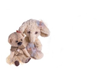 Soft toys on a white background with a place for an inscription.
