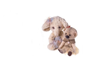 Soft toys on a white background with a place for an inscription.