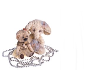 Soft toys on a white background with a place for an inscription.