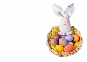 Easter bunny with eggs on a white background with a place for an inscription.