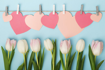 Tulips and pink paper hearts as Mother's Day decoration