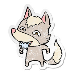 distressed sticker of a cartoon hungry wolf