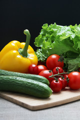 Bright vegetables at the table	