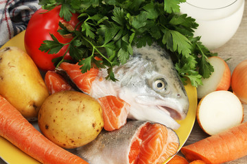 Ingredients for traditional nordic creamy soup with salmon