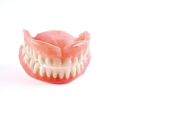 Artificial teeth on a white background