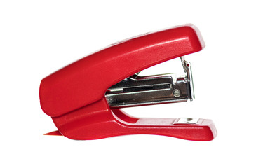 small short red stapler on white background