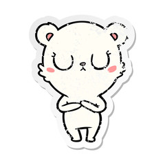 distressed sticker of a peaceful cartoon polar bear