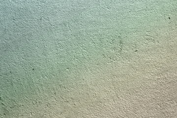 grainy aged stucco on the table texture - cute abstract photo background