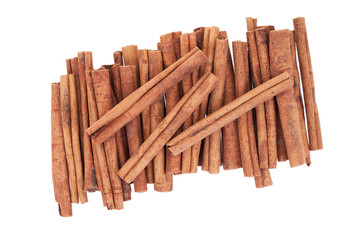 Cinnamon sticks isolated on white background. Top view.