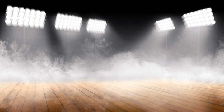 Sports arena with wooden floor with smokes and spotlights