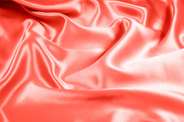 Obraz premium Closeup of rippled coral satin fabric