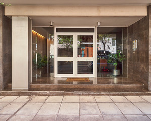 elegant apartment building entrance, downtown Athens Greece