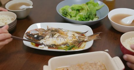 Couple have dinner together at home