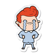 sticker of a cartoon man crying