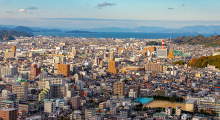 matsuyama city with Inland sea in background during sunset in Ehime Japan