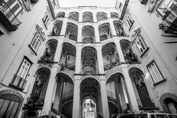 Fototapeta na wymiar NAPLES, ITALY - JANUARY 24, 2019 - The Spagnolo Palace is a Rococo or late-Baroque-style palace in Rione Sanità in central Naples. It is best known for its elaborate staircase