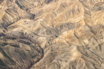 Fototapeta premium DESERT, ISRAEL - February 28, 2019: Flying over the yellow Desert of Israel.