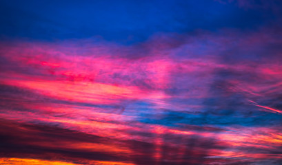 sunrise rays through the clouds
