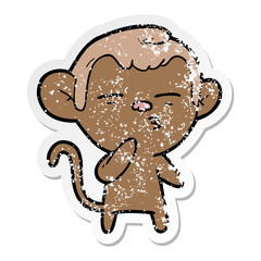 distressed sticker of a cartoon suspicious monkey