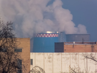 Pipes smoke, carry out harmful emissions. Global warming. Carbon dioxide emissions