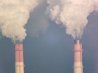 Pipes smoke, carry out harmful emissions. Global warming. Carbon dioxide emissions