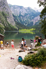Konigssee Lake, German - May 29, 2018: Tourists on the lake, in the Alpine mountains