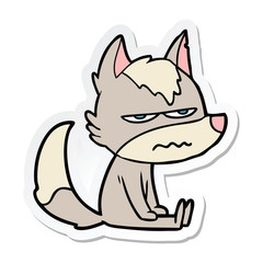 sticker of a cartoon annoyed wolf