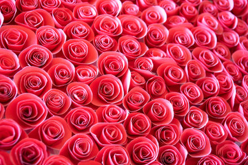 Beautiful bloom paper red rose for background  . 